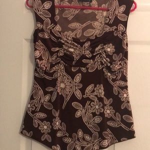 Brown and white tank